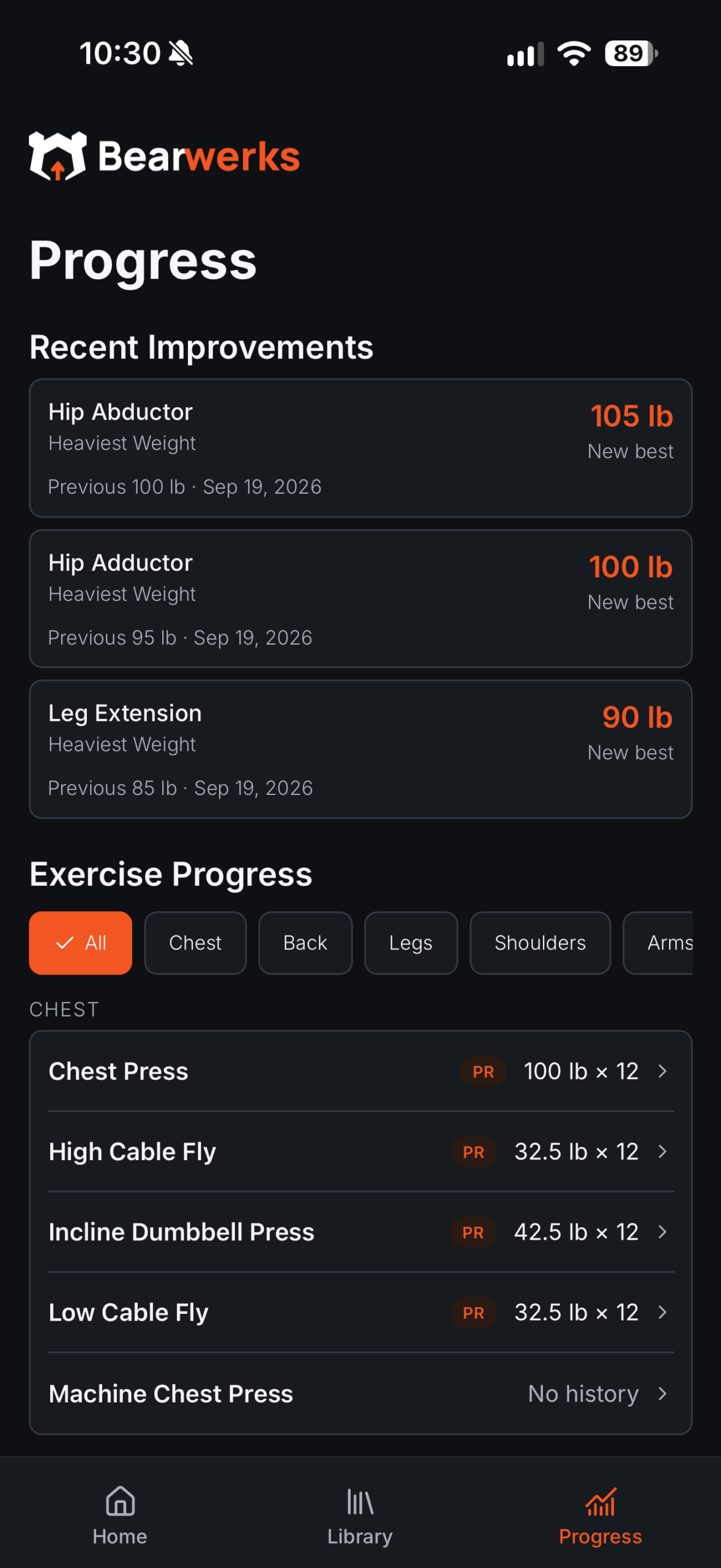 Progress screen showing recent improvements, personal records, and an exercise directory.